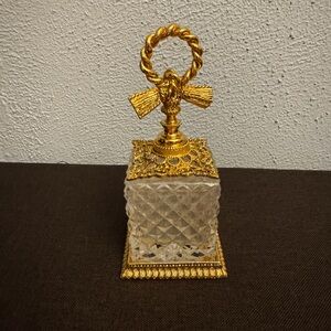 Elegant Gold and Clear Glass Perfume Bottle